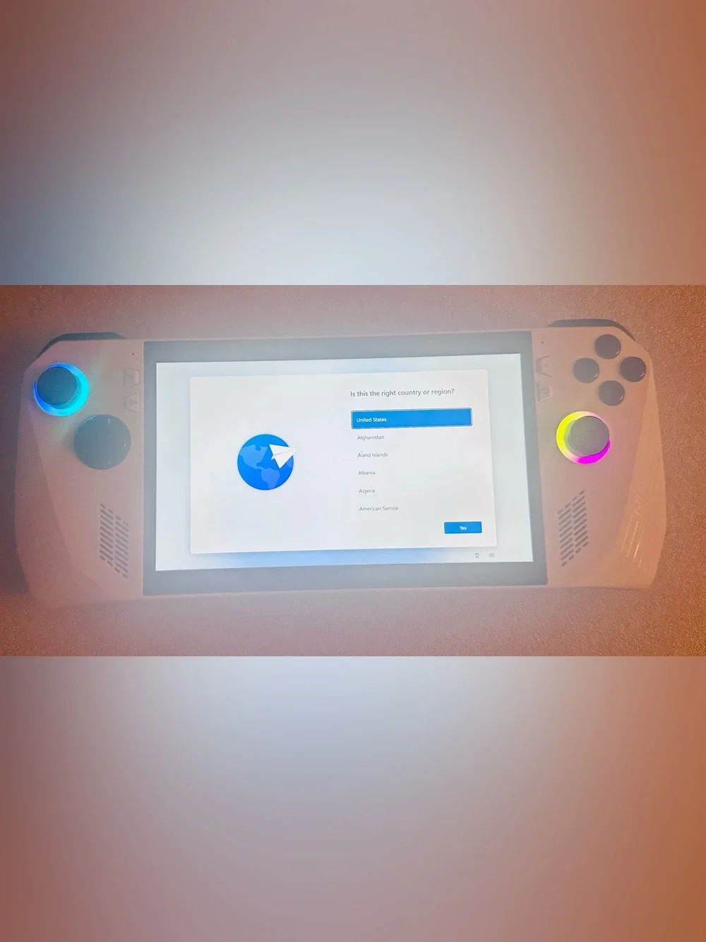 White Handheld Gaming Console with RGB Analog Rings